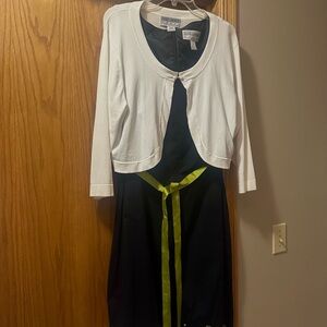 White Cardigan with Black Dress and Green Accent